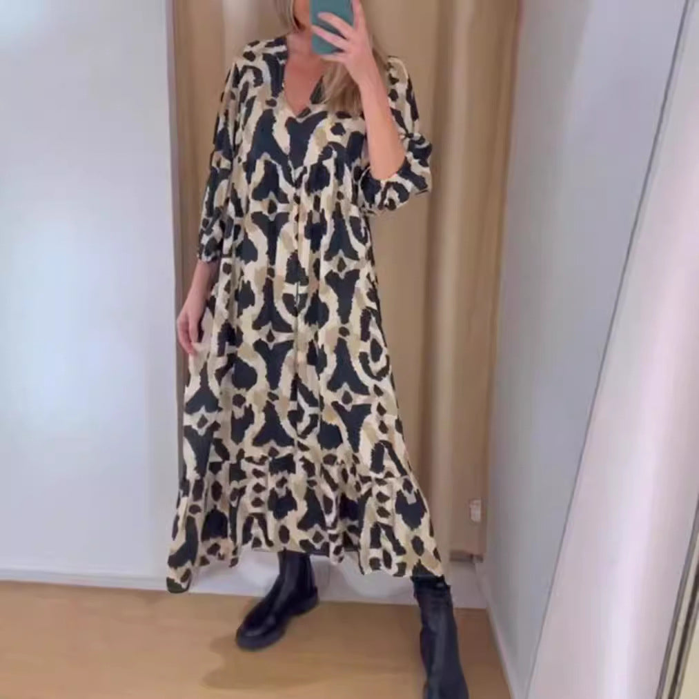 Women's flowing tiered maxi dress with V-neck, gathered bust panel and three-quarter sleeves Mune Fashion