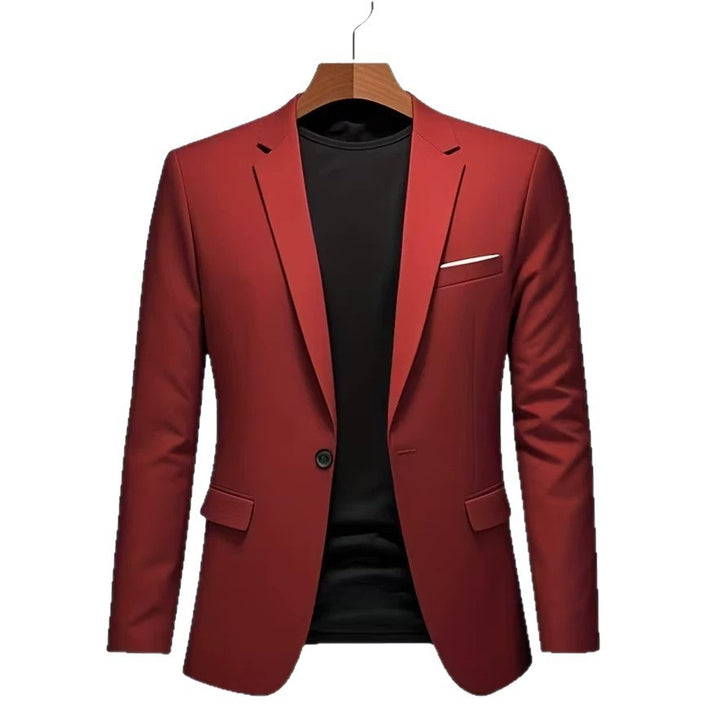 Men's slim-fit tuxedo jacket with prominent lapels, concealed breast piping, and light shoulder padding Mune Fashion