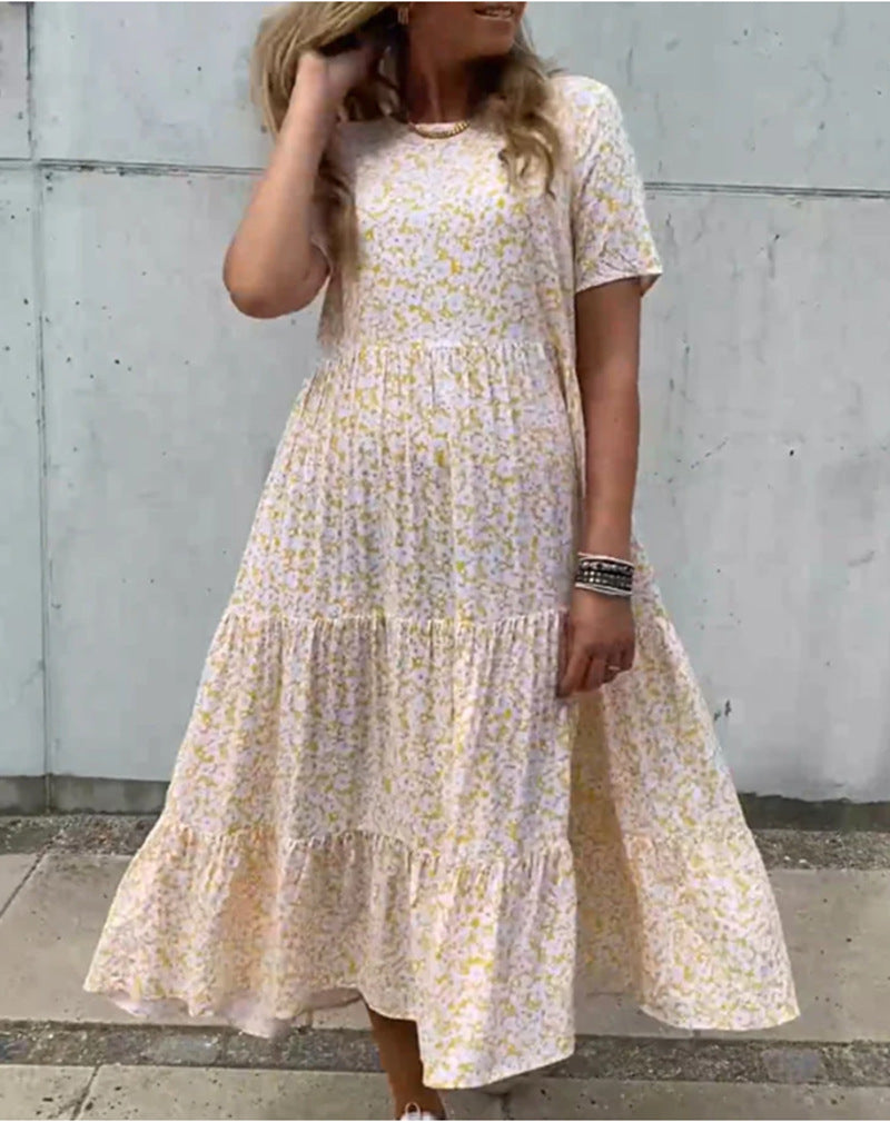 Women's flowing tiered maxi dress in Boho babydoll style with gathered underbust and short sleeves Mune Fashion