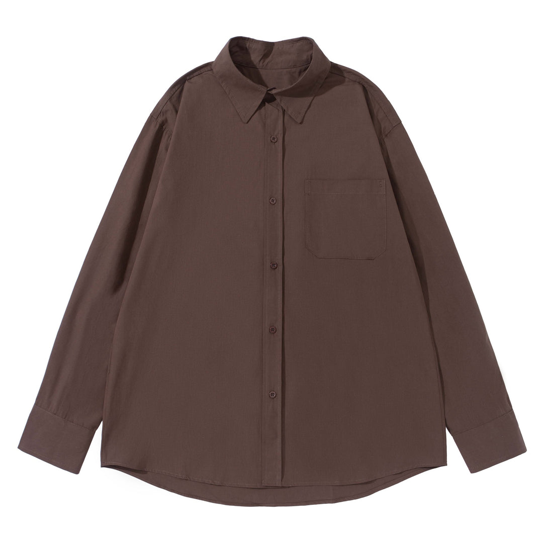 Unisex Boxy shirt with Kent collar, applied breast pocket and relaxed fit Mune Fashion