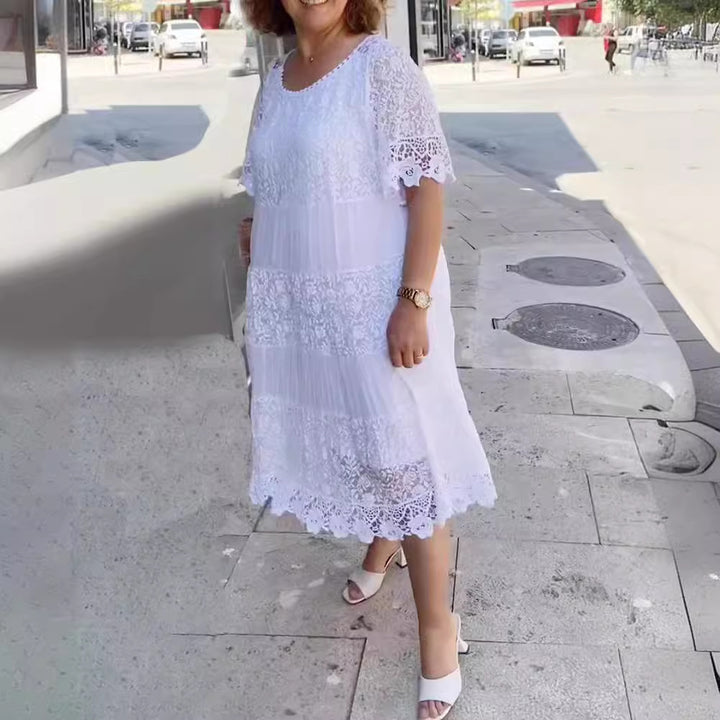 Women's midi dress with lace tiers, pleated inserts and short trumpet sleeves Mune Fashion