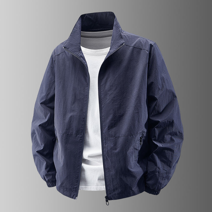 Men's breathable lightweight windbreaker with stand-up collar, elastic cuffs and concealed zippered pockets Mune Fashion
