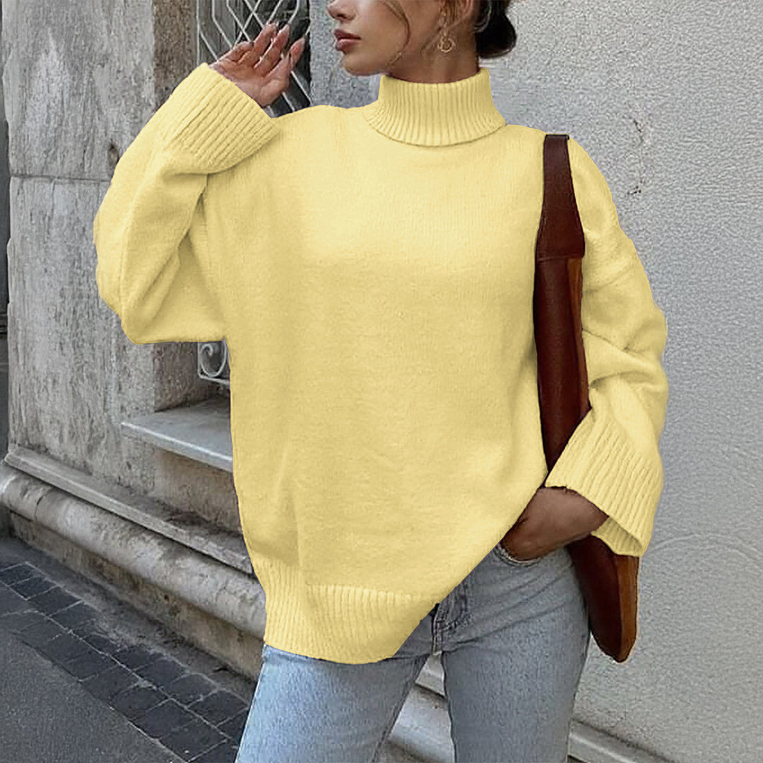 Women's oversized turtleneck sweater with wide ribbed collar, voluminous balloon sleeves, and extended cuffs Mune Fashion
