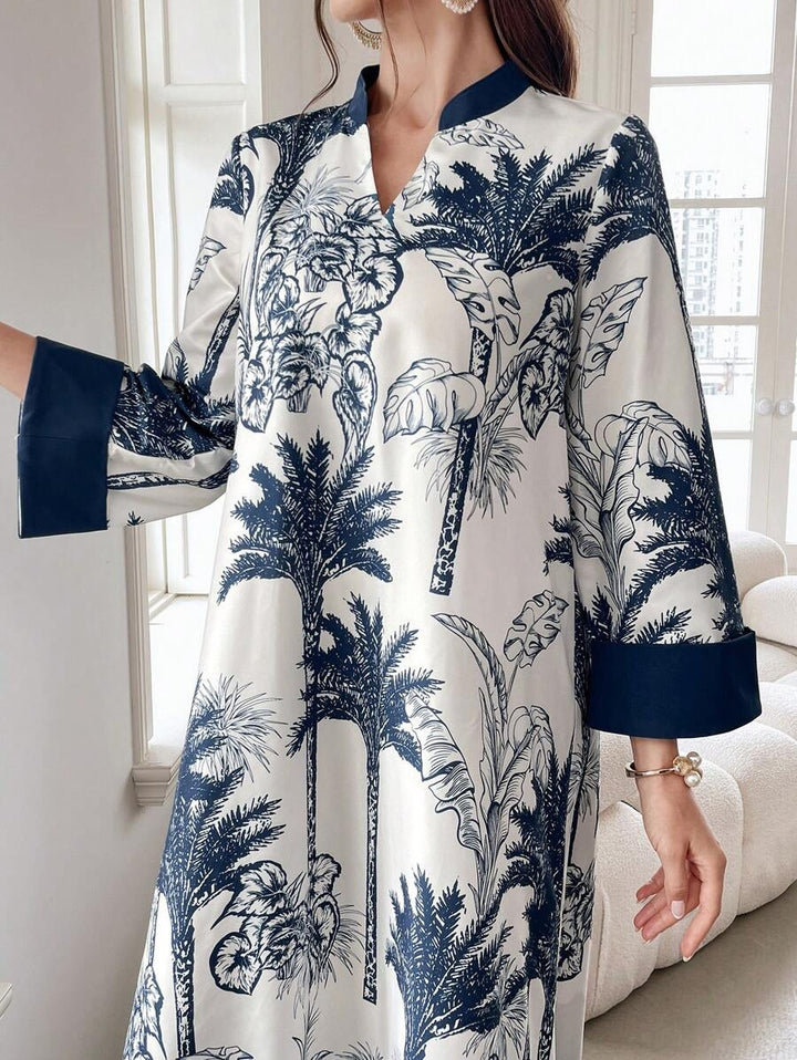Women's maxi dress in satin look with palm print, stand-up collar and wide 3/4 sleeves Mune Fashion