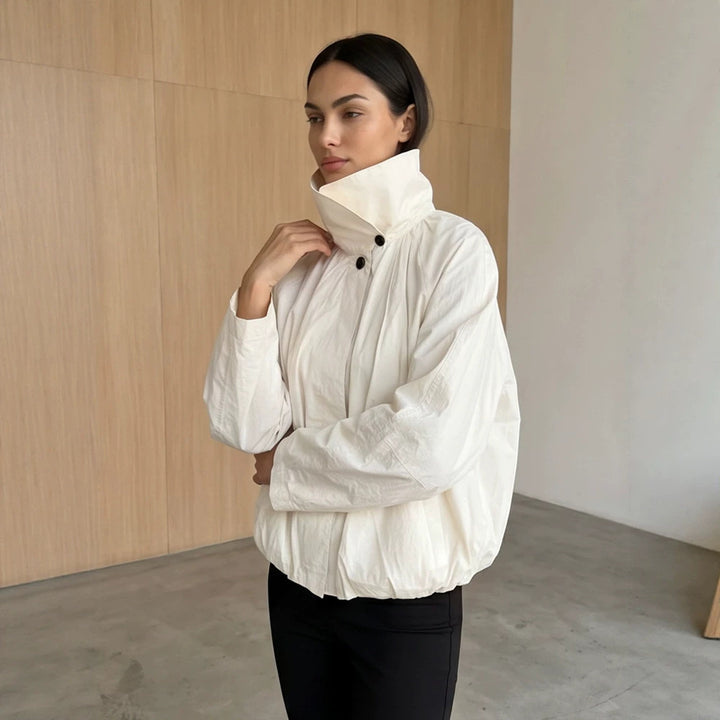 Women's short jacket with high stand-up collar, gathered shoulder area, and elastic hem Mune Fashion