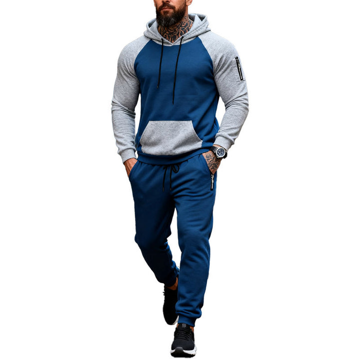 Men's two-piece hooded sweat set with raglan sleeves, sleeve zip pocket, and tapered jogging pants Mune Fashion