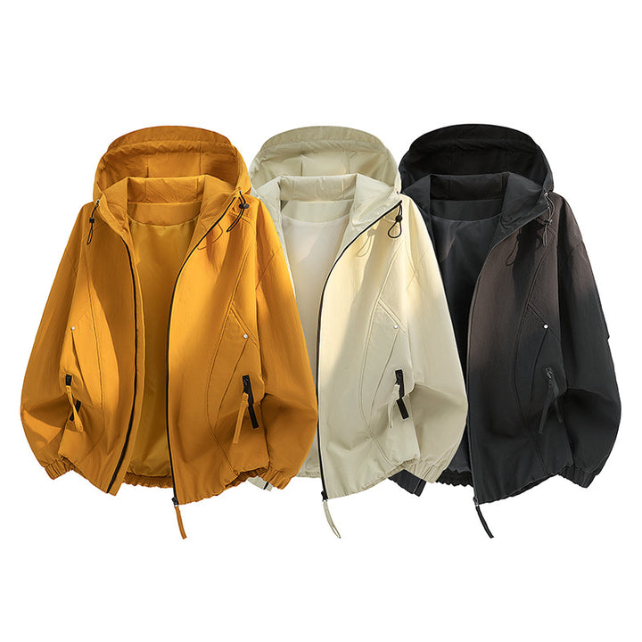 Women's lightweight hooded transitional jacket in oversized cut with elastic hem and concealed zipper pockets Mune Fashion