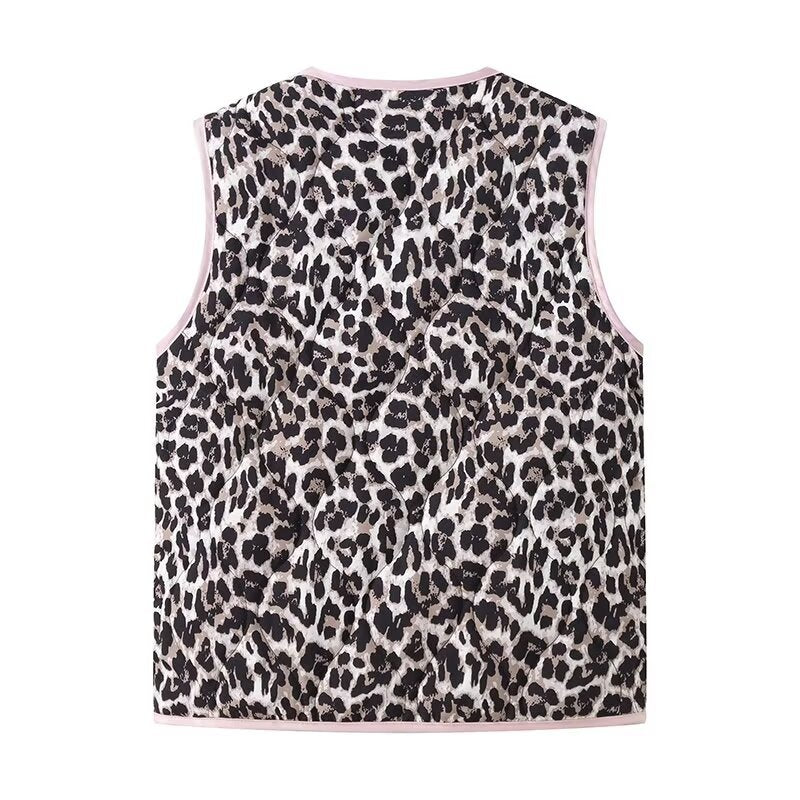 Ladies nan lightweight quilted reversible vest with leopard print, contrast piping, and double bow closure Mune Fashion