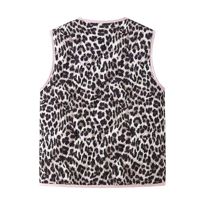 Ladies nan lightweight quilted reversible vest with leopard print, contrast piping, and double bow closure Mune Fashion