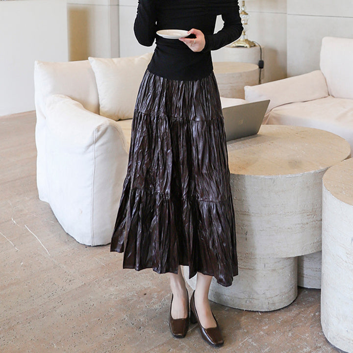 Women's tiered maxi skirt in coated crinkle material with elastic comfort waistband Mune Fashion