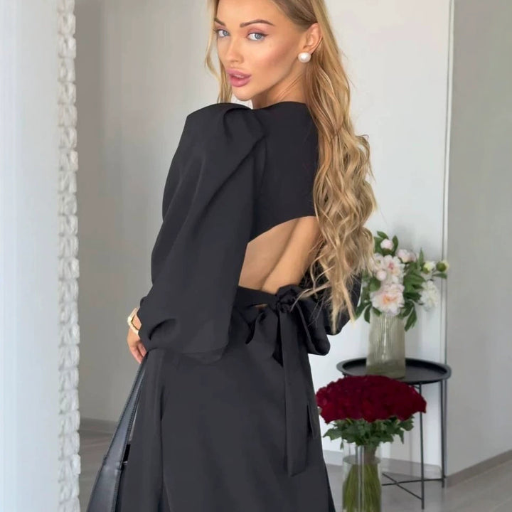 Women's midi dress with open back cutout, voluminous puff sleeves and tie belt Mune Fashion
