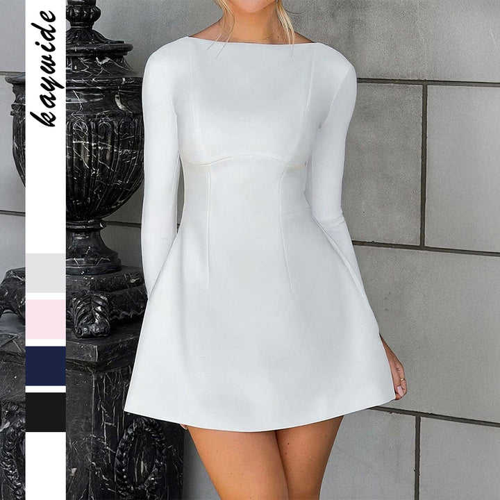 Women's fitted A-line dress with boat neckline, long sleeves and discreet side pockets Mune Fashion