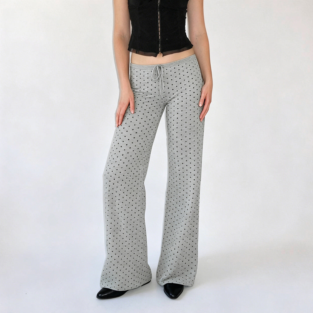 Women's comfortable high-waist lounge pants with wide flare, elastic comfort waistband, drawstring, and subtle dot print Mune Fashion