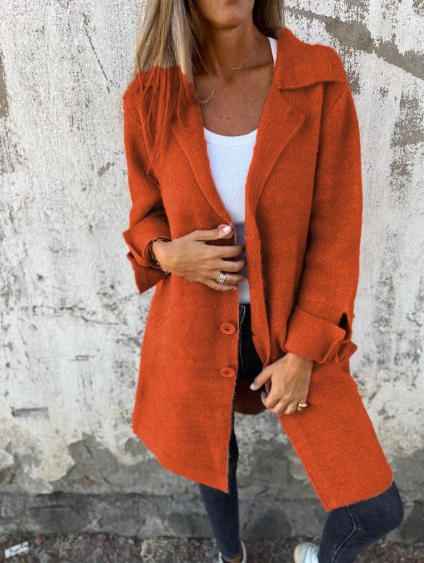 Women nan Oversize wool blend coat with lapel collar, patch pockets, buttoned front, and rolled-up sleeves Mune Fashion