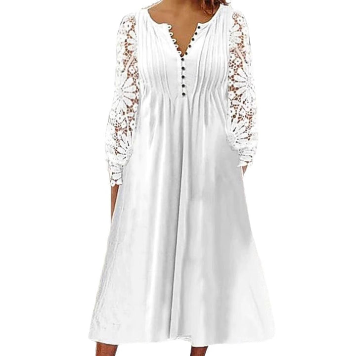 Ladies' knee-length A-line summer dress with crocheted long sleeves, pleated bodice and decorative button placket Mune Fashion