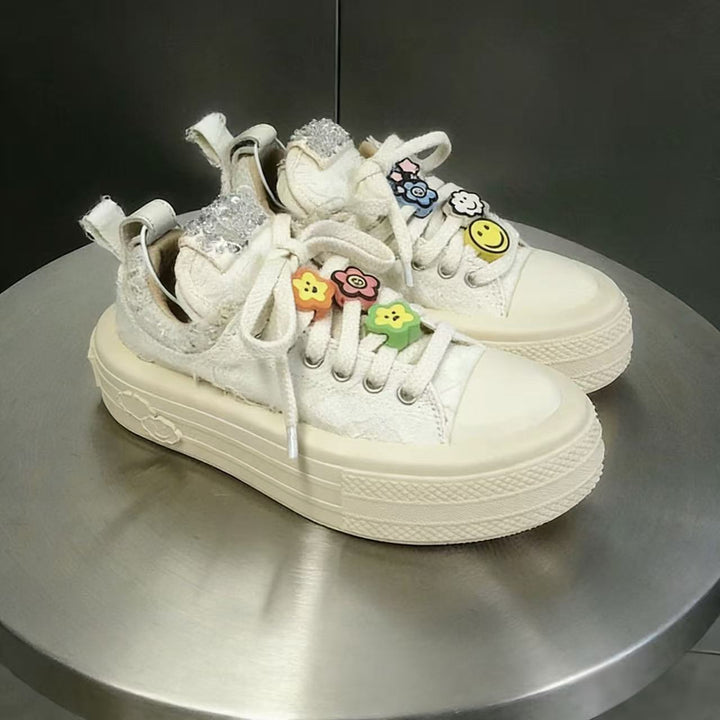 Women's sneakers with glittering appliqués and raised platform Mune Fashion