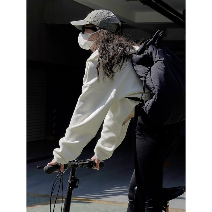 Women short jacket with hood, concealed zipper and elastic hem Mune Fashion