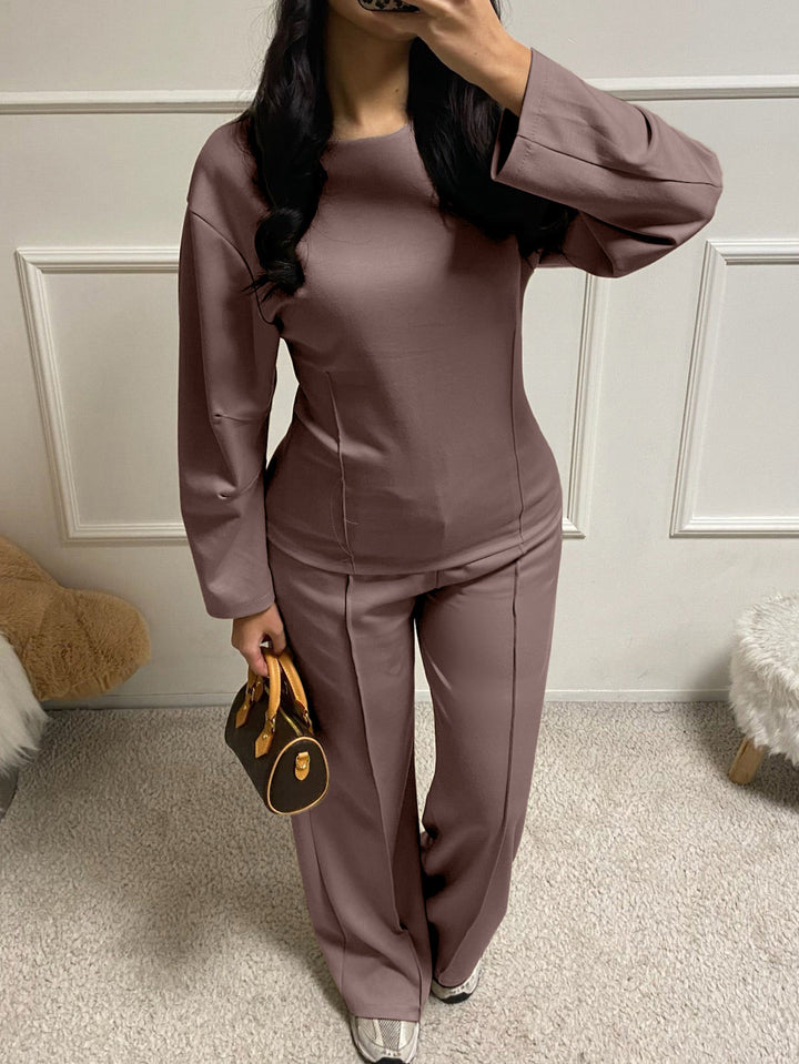 Women's soft lounge set with fitted sweatshirt, sculpting seam details, and wide palazzo pants leg Mune Fashion
