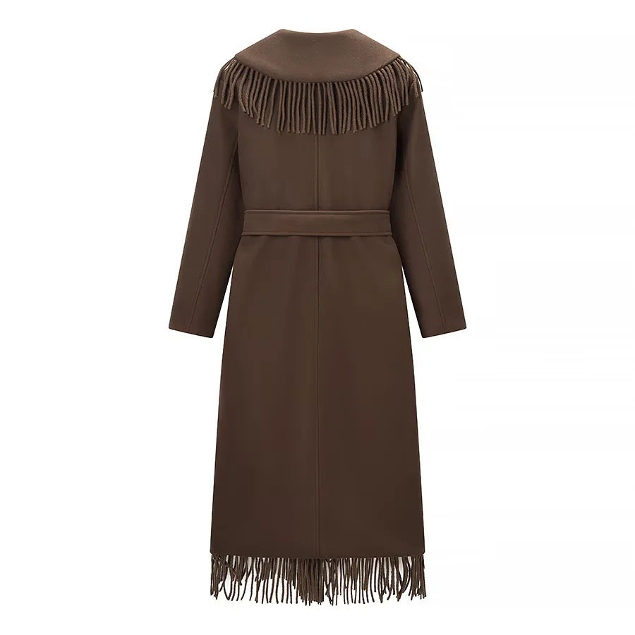 Ladies long fringed coat with voluminous shawl collar, waist belt and patch pockets Mune Fashion