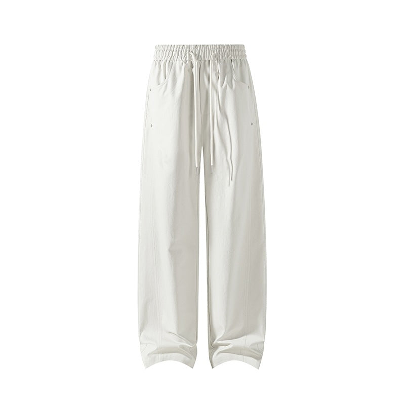 Ladies wide-cut lounge pants with drawstring, high waist and deep side pockets Mune Fashion