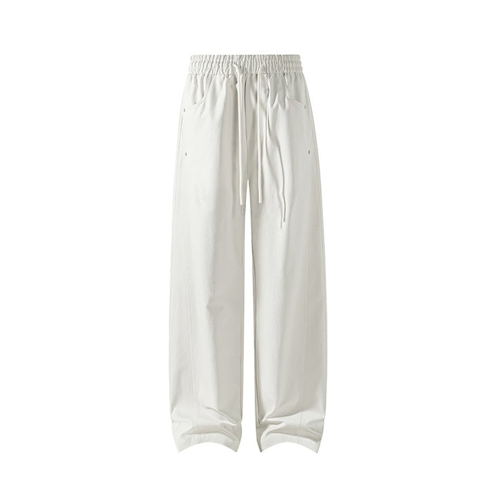 Ladies wide-cut lounge pants with drawstring, high waist and deep side pockets Mune Fashion