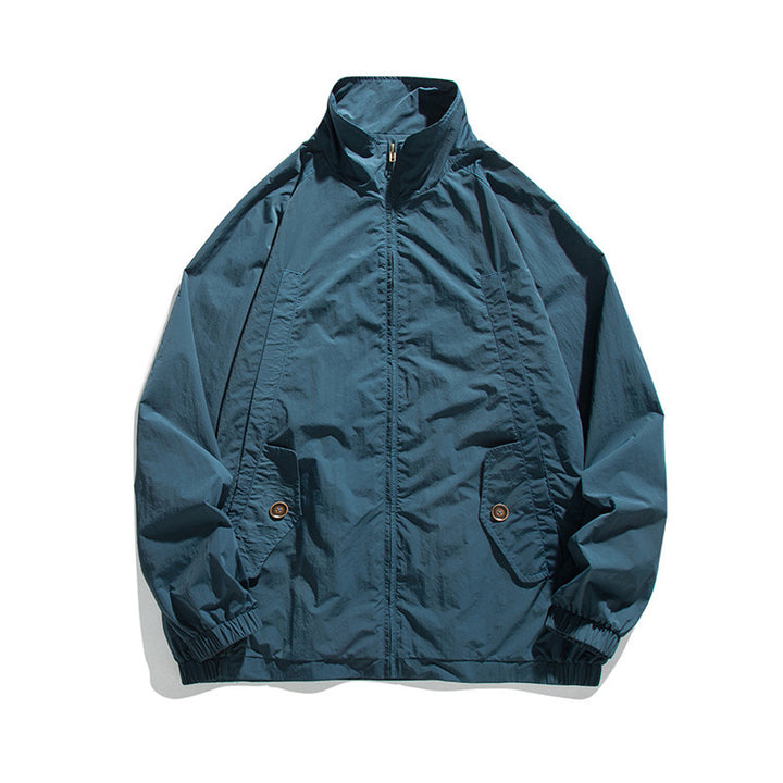 Men's Lightweight Oversized Field Jacket made of technical nylon with stand-up collar, concealed zipper, and flap pockets Mune Fashion