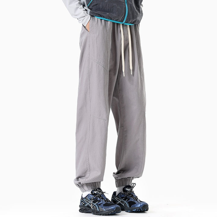 Men's Oversized Utility Jogging Pants made of sturdy cotton blend with drawstring waistband, side cargo pockets & ribbed cuffs Mune Fashion