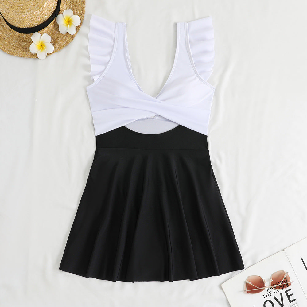Women's swimsuit with floral ruffle design and skater-like skirt Mune Fashion
