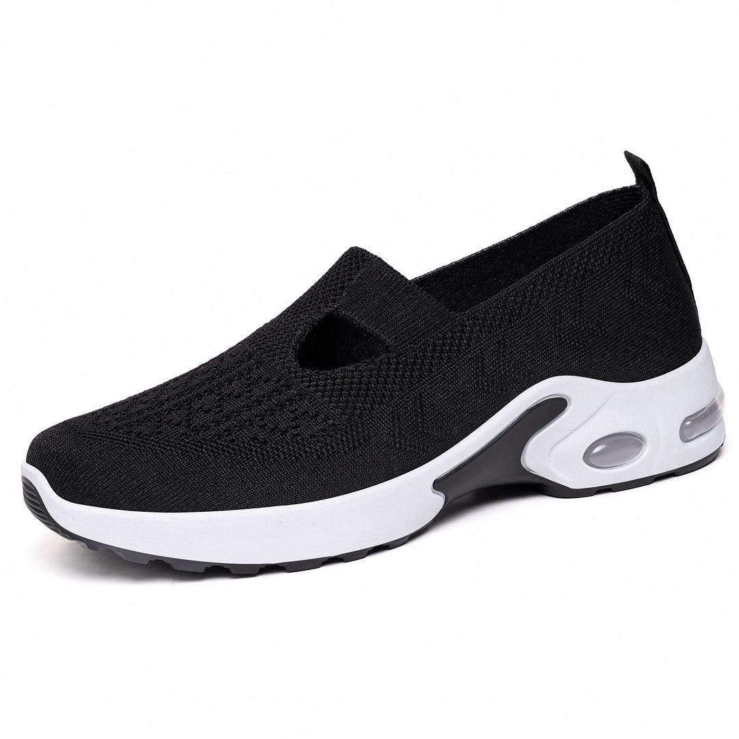 Women’s knitted slip-on sports slipper with elastic entry, cut-out detail, and visible air cushioning Mune Fashion