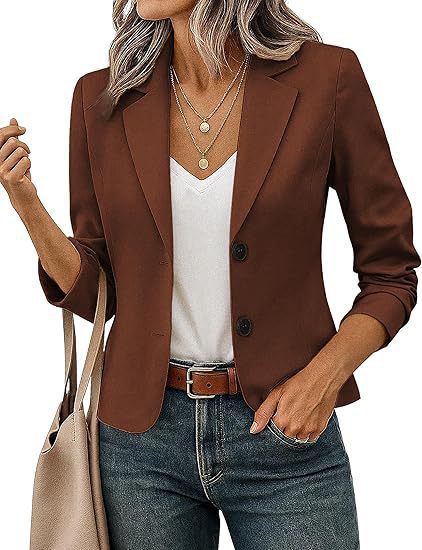 Ladies tailored short blazer with decorative buttons and three-quarter sleeves Mune Fashion