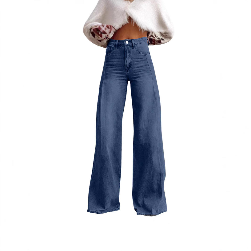 Women high-waisted flared jeans with extra wide leg, figure-flattering fit and subtle vintage wash Mune Fashion