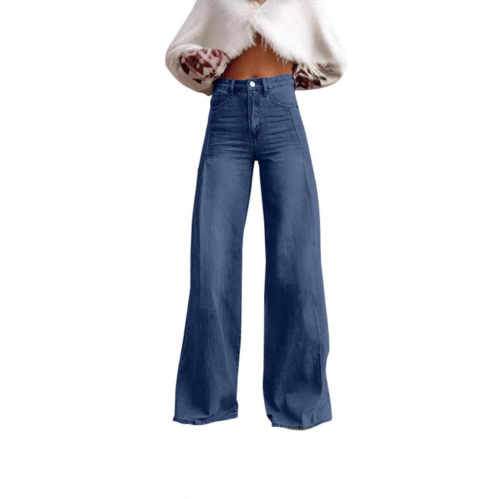 Women high-waisted flared jeans with extra wide leg, figure-flattering fit and subtle vintage wash Mune Fashion