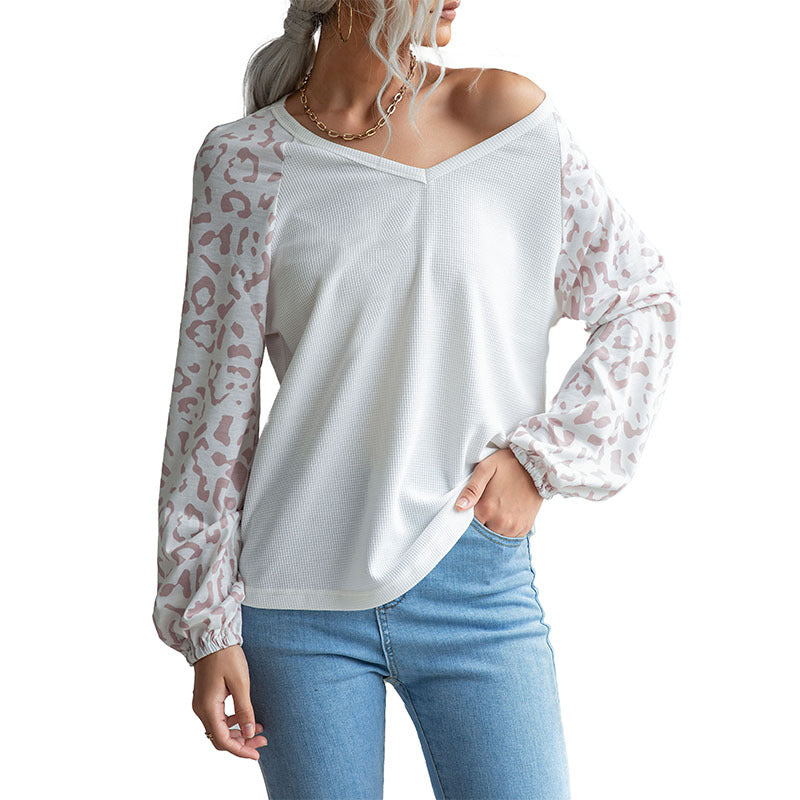 Ladies V-neck waffle knit top with transparent net sleeves in leopard print Mune Fashion