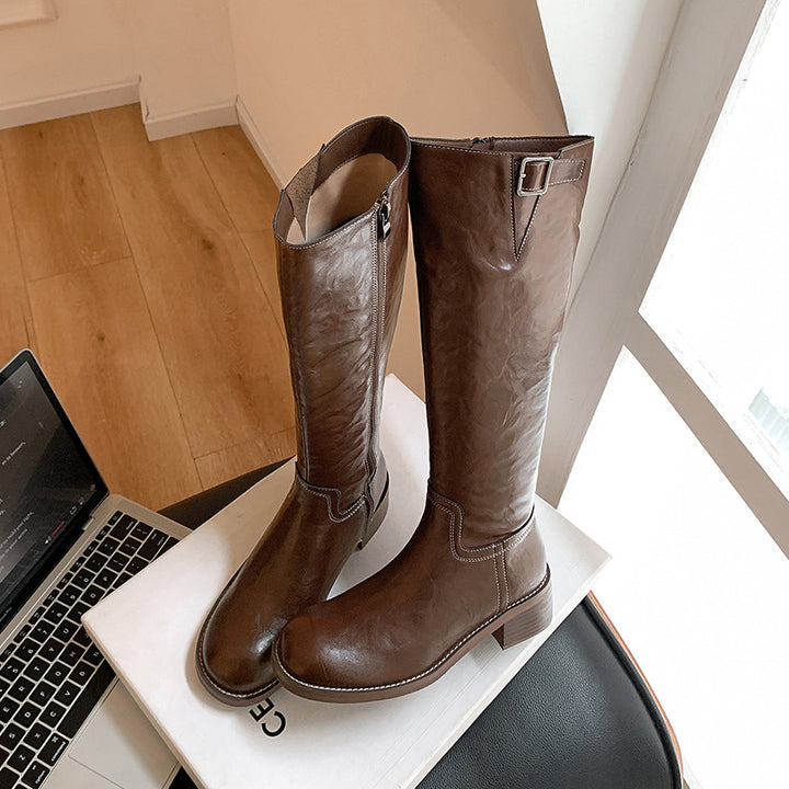 Women’s knee-high leather boots with decorative strap, contrasting seam and low block heel Mune Fashion