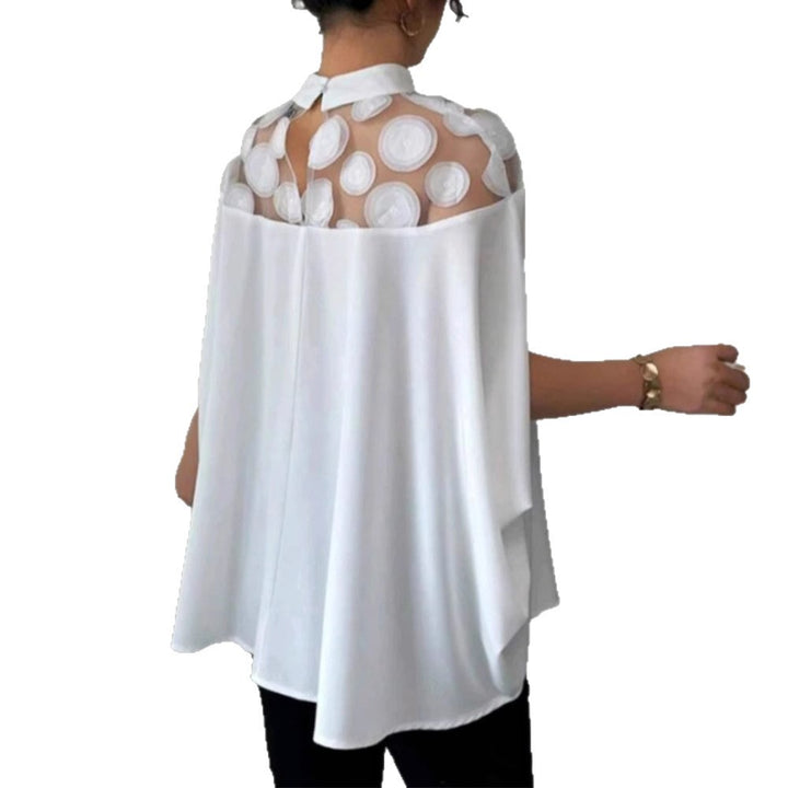 Women's elegant tunic blouse with stand-up collar, transparent round application panel and cape sleeves Mune Fashion