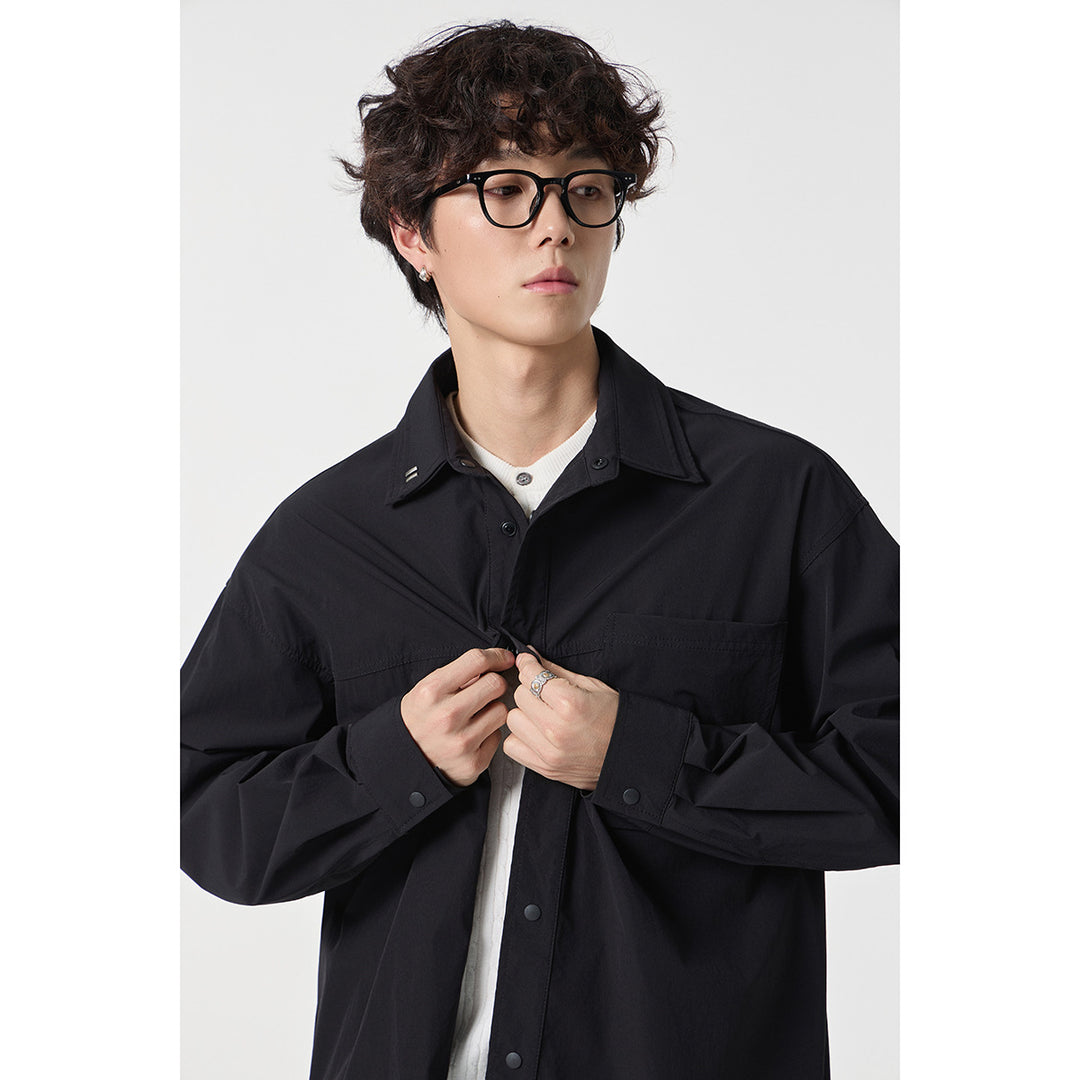 Unisex Oversize Shirt with technical material, breast flap and rounded hem Mune Fashion