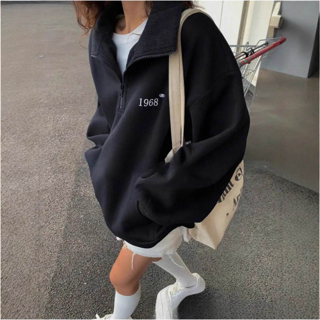 Women's oversized half-zip sweatshirt with high collar, kangaroo pocket, and casual oversized fit Mune Fashion