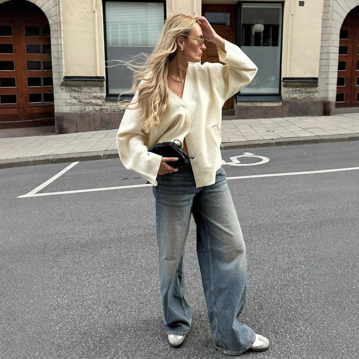 Women's chunky knit cardigan with deep V-neckline, boxy oversized silhouette and patch pockets Mune Fashion