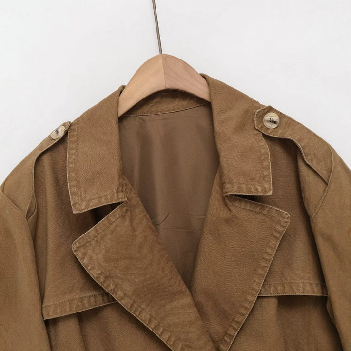 Women's Cropped Trench Blouson Jacket with double-breasted button placket, shoulder patches, and elastic hem Mune Fashion