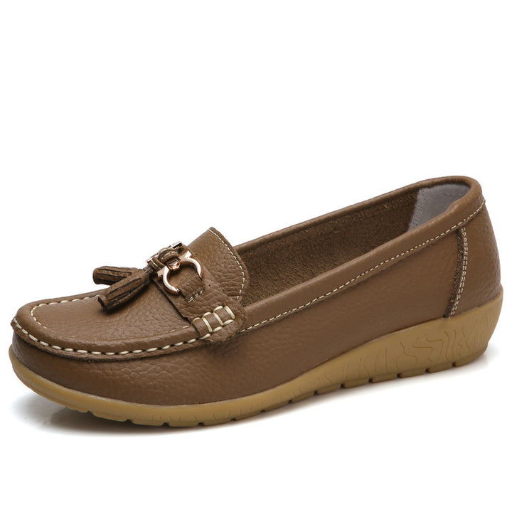 Women's classic tassel moccasin made of textured synthetic leather with padded comfort insole and flexible wedge sole Mune Fashion