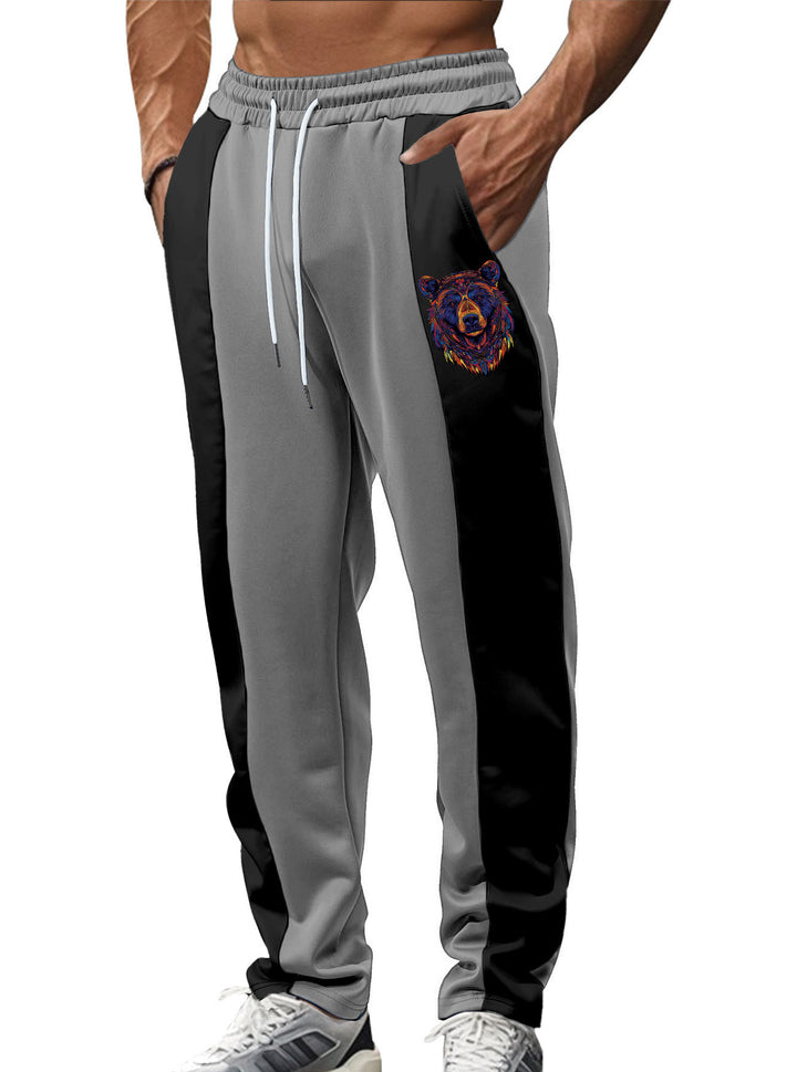 Men's sporty track pants with side contrast stripes, elastic waistband, drawstring, and deer embroidery Mune Fashion