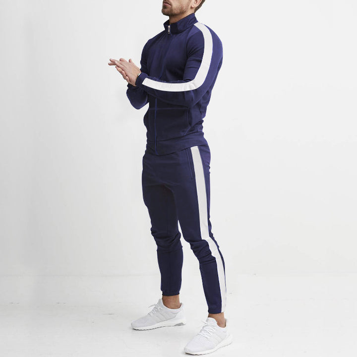 Men's fitted sports outfit with stand-up collar, full-length zip and tapered sports pants with side stripes Mune Fashion