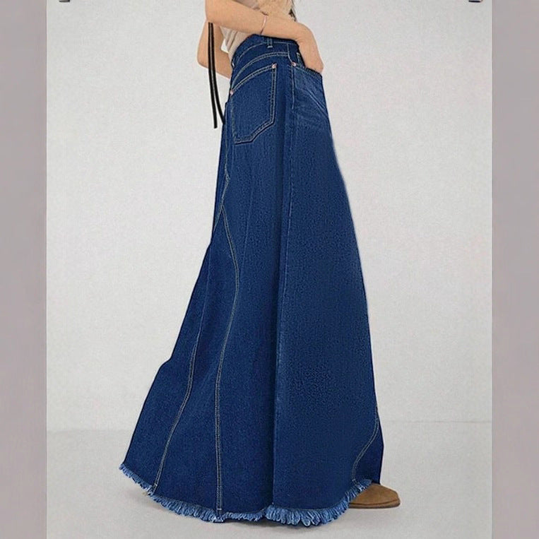 Women’s high-waisted A-line denim maxi skirt with decorative seams and raw fringe hem Mune Fashion