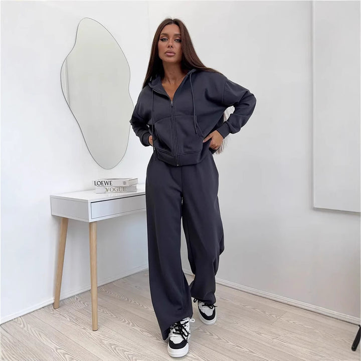 Women's loose high-waist lounge pants made of sweatshirt fabric with drawstring and side pockets Mune Fashion