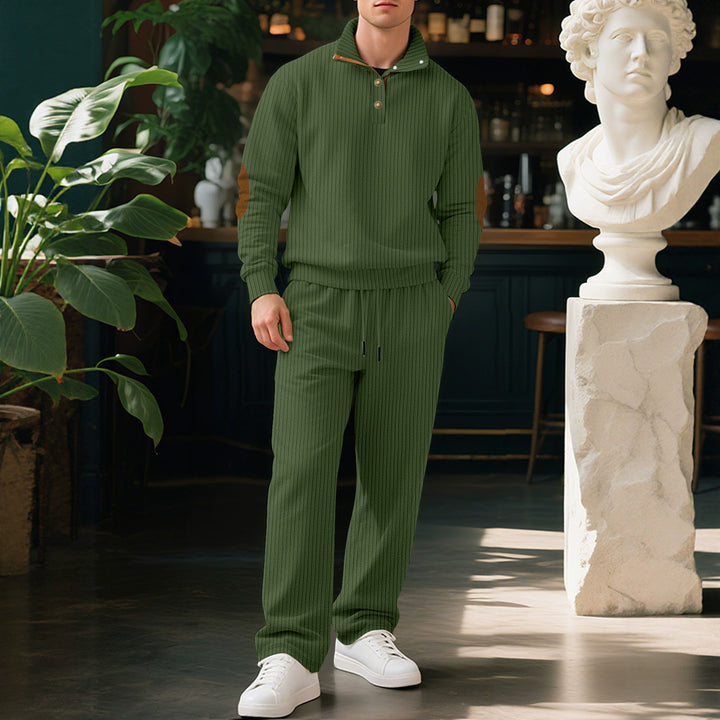 Men's fine ribbed sweater with half button placket, high stand-up collar, and contrasting suede elbow patches Mune Fashion