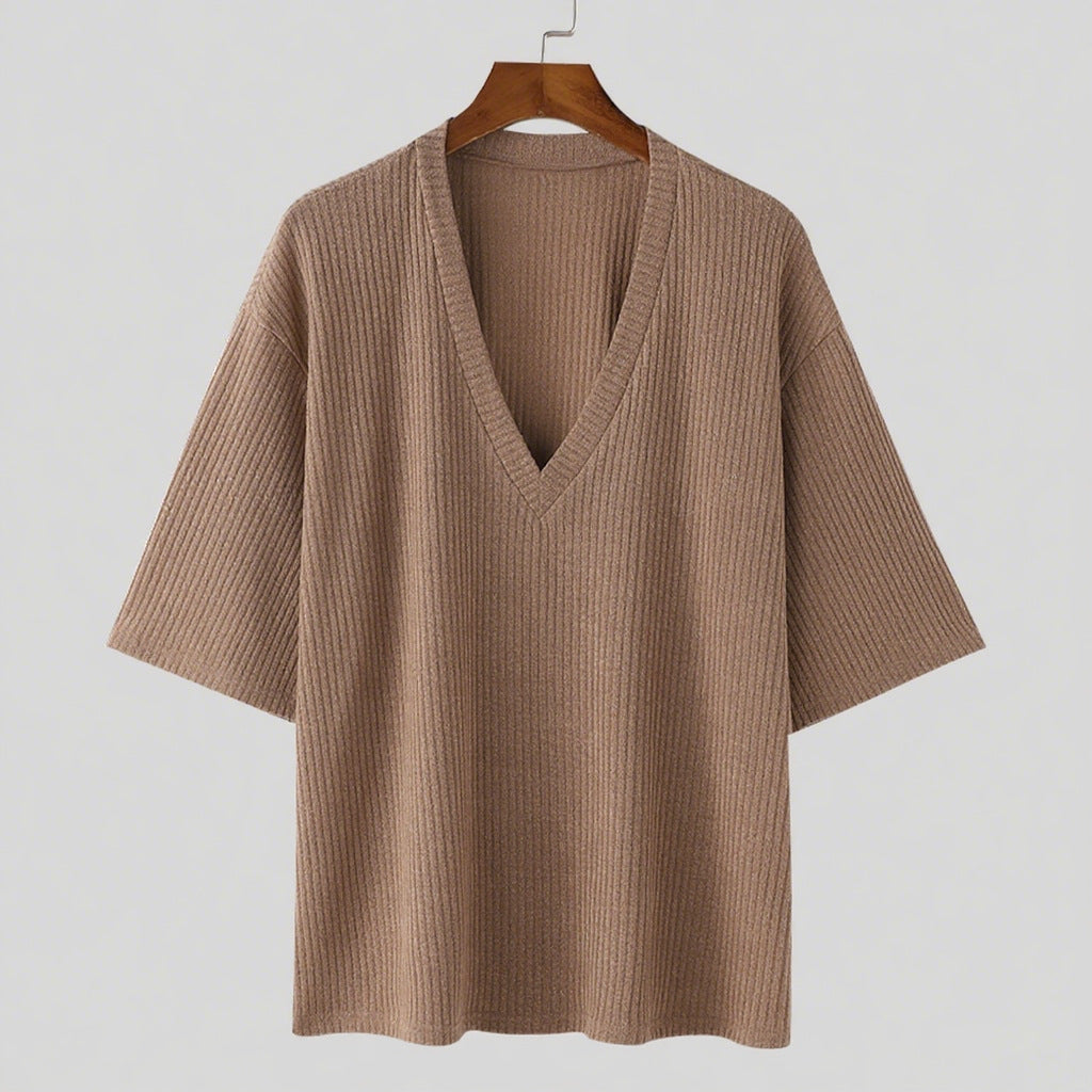 Women's oversized V-neck knit top with textured ribbed look and half-length sleeves Mune Fashion