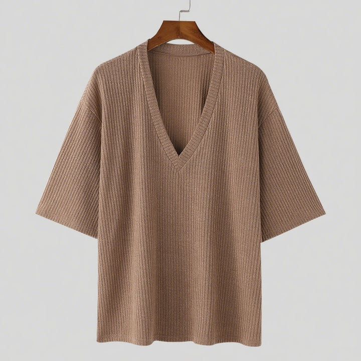 Women's oversized V-neck knit top with textured ribbed look and half-length sleeves Mune Fashion