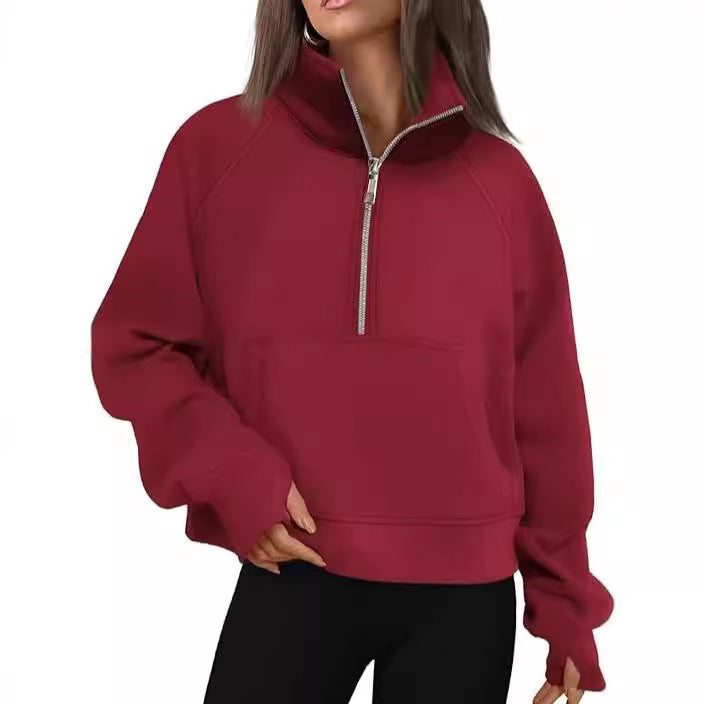 Women’s oversized half-zip sweater with kangaroo pocket, thumb holes, and high collar Mune Fashion