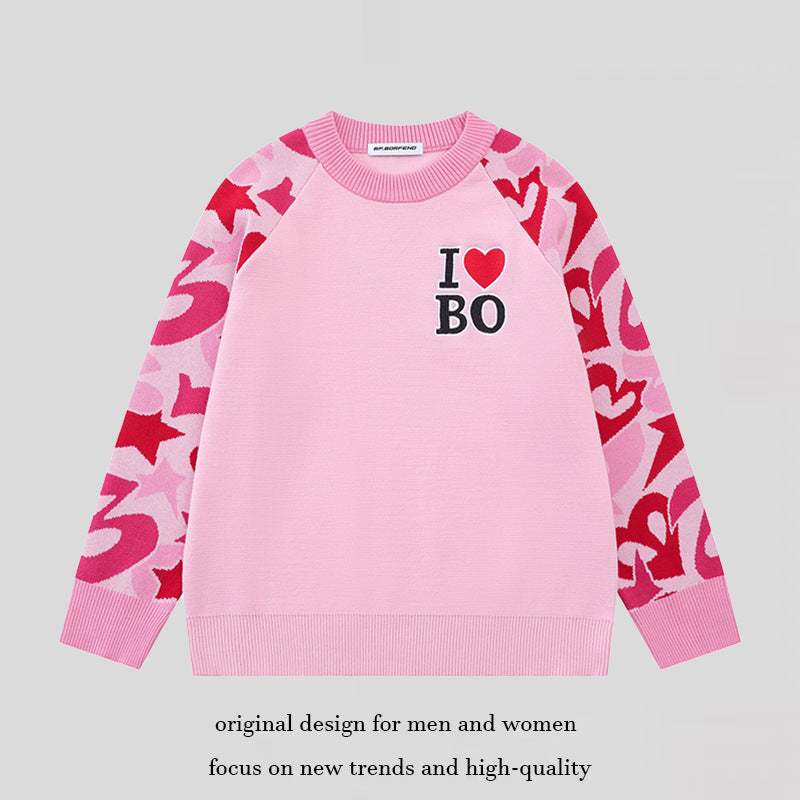 Women's knit sweater with raglan sleeves, statement jacquard sleeves, and ribbed hem Mune Fashion