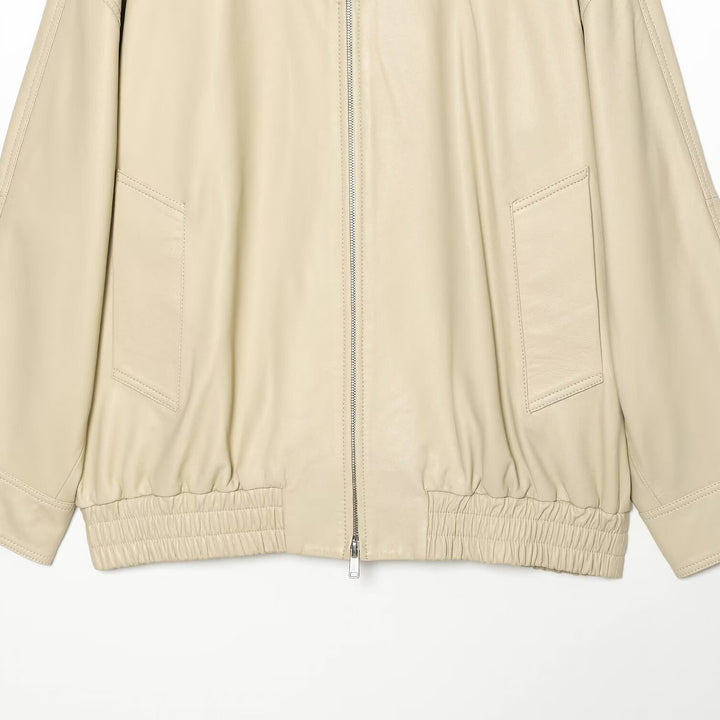 Women's loosely cut leather-look transitional jacket with stand-up collar, two-way zipper, and kangaroo pockets Mune Fashion